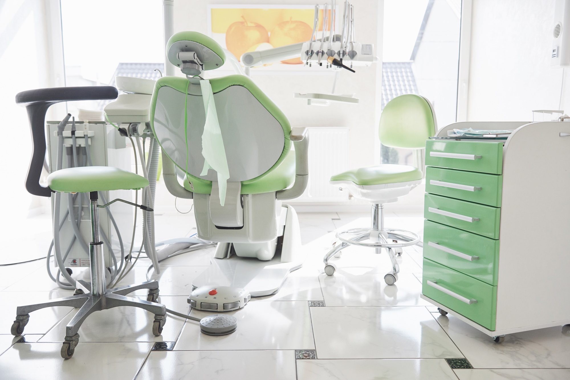 Dental clinic interior, design with chair and tools. All furniture in the same color