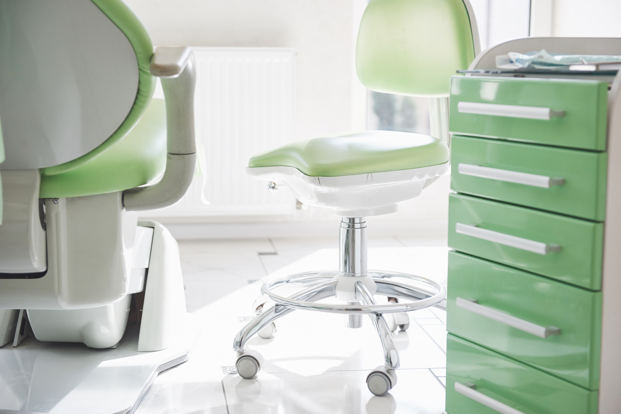 Dental clinic interior, design with chair and tools. All furniture in the same color